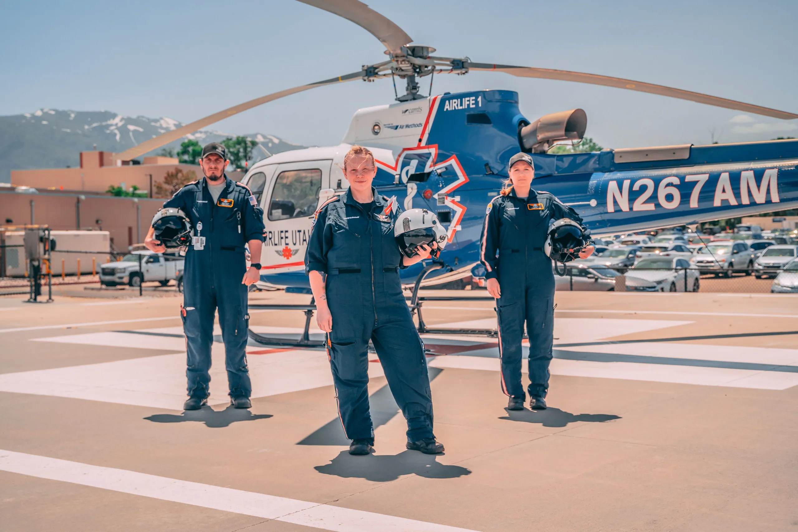 Air medical crew with helicopter